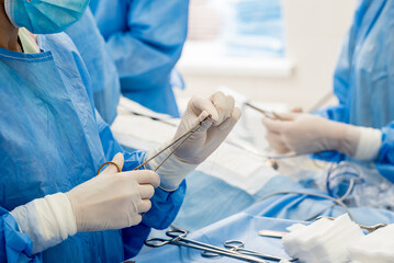 Surgery to remove the breast and replace it with an implant.