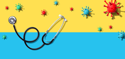 Stethoscope with coronavirus theme overhead view - flat lay