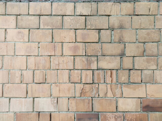 Old brickwork. Brick wall. Burst bricks