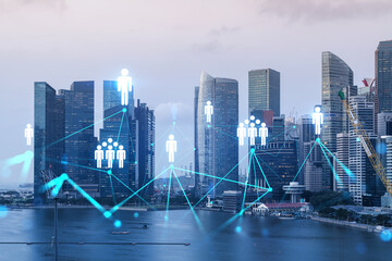 Social media icons hologram over panorama city view of Singapore, Asia. The concept of people...
