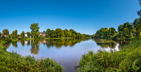 Reinbek, Germany, near Hamburg. The lake Muehlenteich and the Reinbek Castle (German: Schloss Reinbek). Built in the 16th century in Dutch Renaissance style, it is beautifully restored.