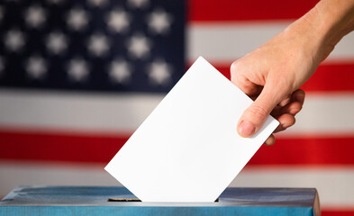 elections in the US - voting ballot and American flag