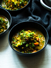 Rustic mung bean dahl curry in natural light.