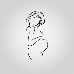 Silhouette of the pregnant woman on a gray gradient background