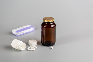 Various medicine bottles and different pills