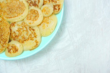  A pile of fresh homemade wheat tortillas on a plate, copy soace 