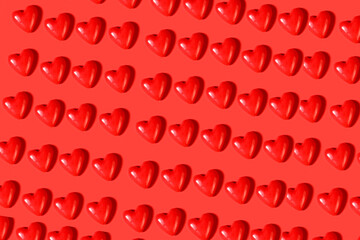 Pattern. Many red hearts on a red background. Valentine's day concept.