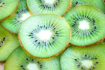 A lot of sliced kiwi fruits