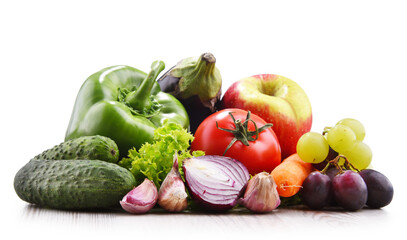 Composition with fresh vegetables and fruits isolated on white