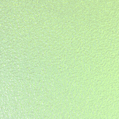 Green pastel foil paper texture background.