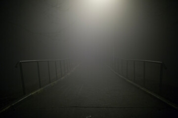 Fototapeta na wymiar foggy road or bridge