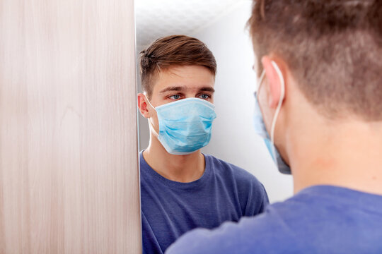 Young Man in Flu Mask
