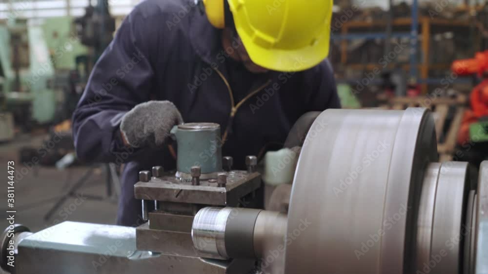 Poster smart factory worker using machine in factory workshop . industry and engineering concept.
