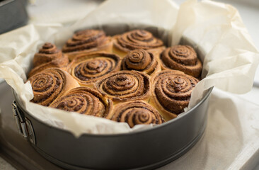 Fresh rolls Cinnabon, Cinnamon rolls in the form. Flavorful pastries