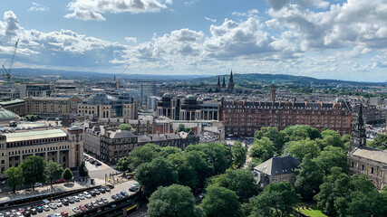 Fototapeta na wymiar Edinburgh, Scotland; August 5, 2019. Scotland view from above with trees and buildings