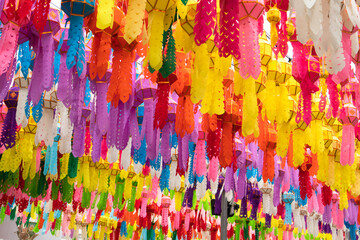 Fototapeta na wymiar background, colorful lanterns hanging on the rope. lantern festival decorated in Thailand.