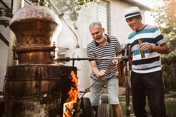 Traditional homemade distillery for making brandy - obrazy, fototapety, plakaty