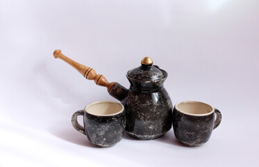 Ceramic set for coffee. Turka and ceramic cups.