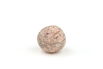 Sea smooth round pebble isolated on white background. Round  ball pebble stone from Baltic sea beach.