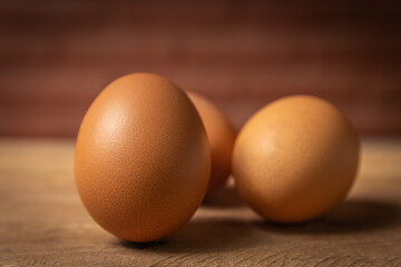 fresh chicken eggs on a old wooden table