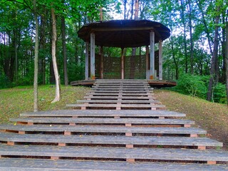 round wooden gazebo and wooden stairs