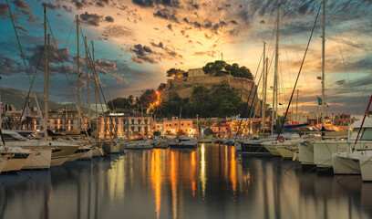 Views of Denia from the port on a September sunset