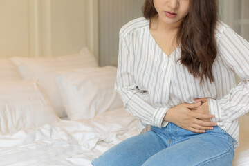 Young Asian women have severe stomachache