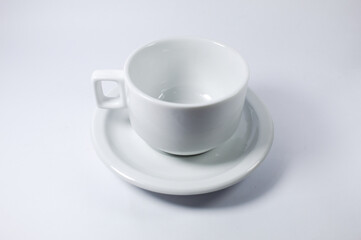 White cup of coffee or tea on a white background