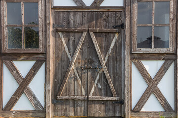 wooden door and windows decorated in the old style