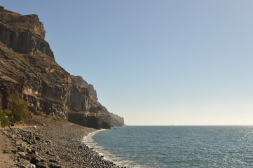 Fototapeta na wymiar Sunset over the Amadores beach on the stunning island of Gran Canaria in Spain