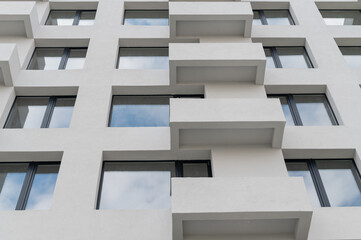 Facade of a modern building with balconies.
