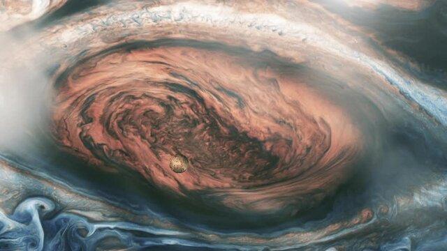 Io, One of the four Galilean Moons orbiting Jupiter, passing over the Great Red Spot. Elements of this video furnished by NASA.