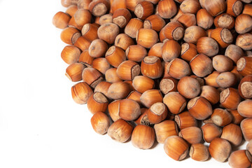 Copyspace background composition with the borders made of hazelnuts isolated over the white background