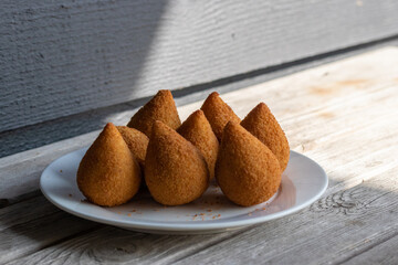Coxinhas, brazilian snacks party food, nicely served in a plate