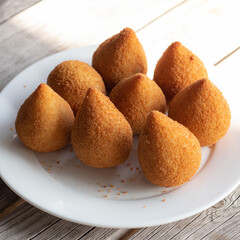 Coxinhas, brazilian snacks party food, nicely served in a plate