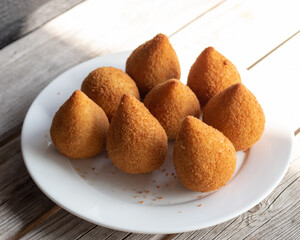 Coxinhas, brazilian snacks party food, nicely served in a plate