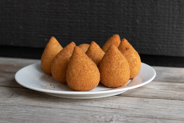 Coxinhas, brazilian snacks party food, nicely served in a plate