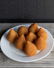 Coxinhas, brazilian snacks party food, nicely served in a plate