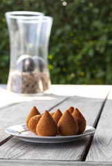 Coxinhas, brazilian snacks party food, nicely served in a plate