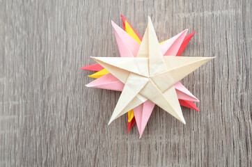 Origami stars collection on wooden