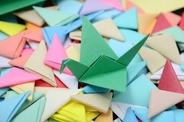 A paper bird with origami background
