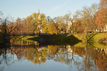 Stunning autumn landscape, colors and water reflections in Riga, Latvia