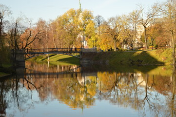 Stunning autumn landscape, colors and water reflections in Riga, Latvia
