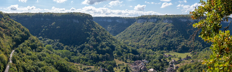 Obraz premium Baume-Les-Messieurs, France - 09 01 2020: View of the Baume-Les-Messieurs circus from a belvedere