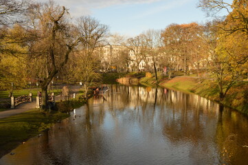 Stunning autumn landscape, colors and water reflections in Riga, Latvia