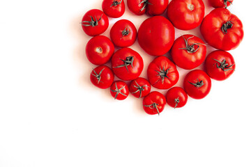 Fresh ripe tomatoes circle shape on white background. Diet and nutrition concept.