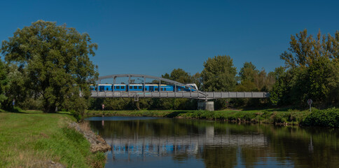Fototapeta premium Railway bridge over Vltava river near Ceske Budejovice city in sunny day