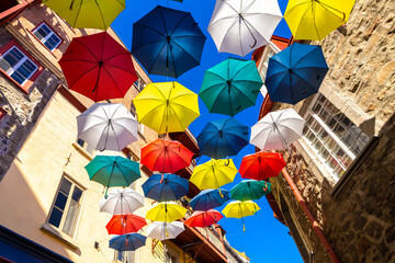 Fototapeta premium Colorful umbrellas in old Quebec