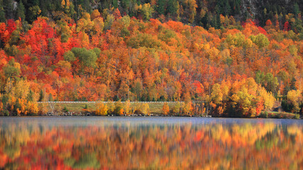 Scenic route Ducarme in northern Quebec along Saint Maurice river in autumn time