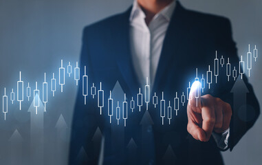 Double exposure of financial graph. Businessman pointing line dot graph. Technical price candlestick chart graph and indicator stock online trading. Forex investment business.